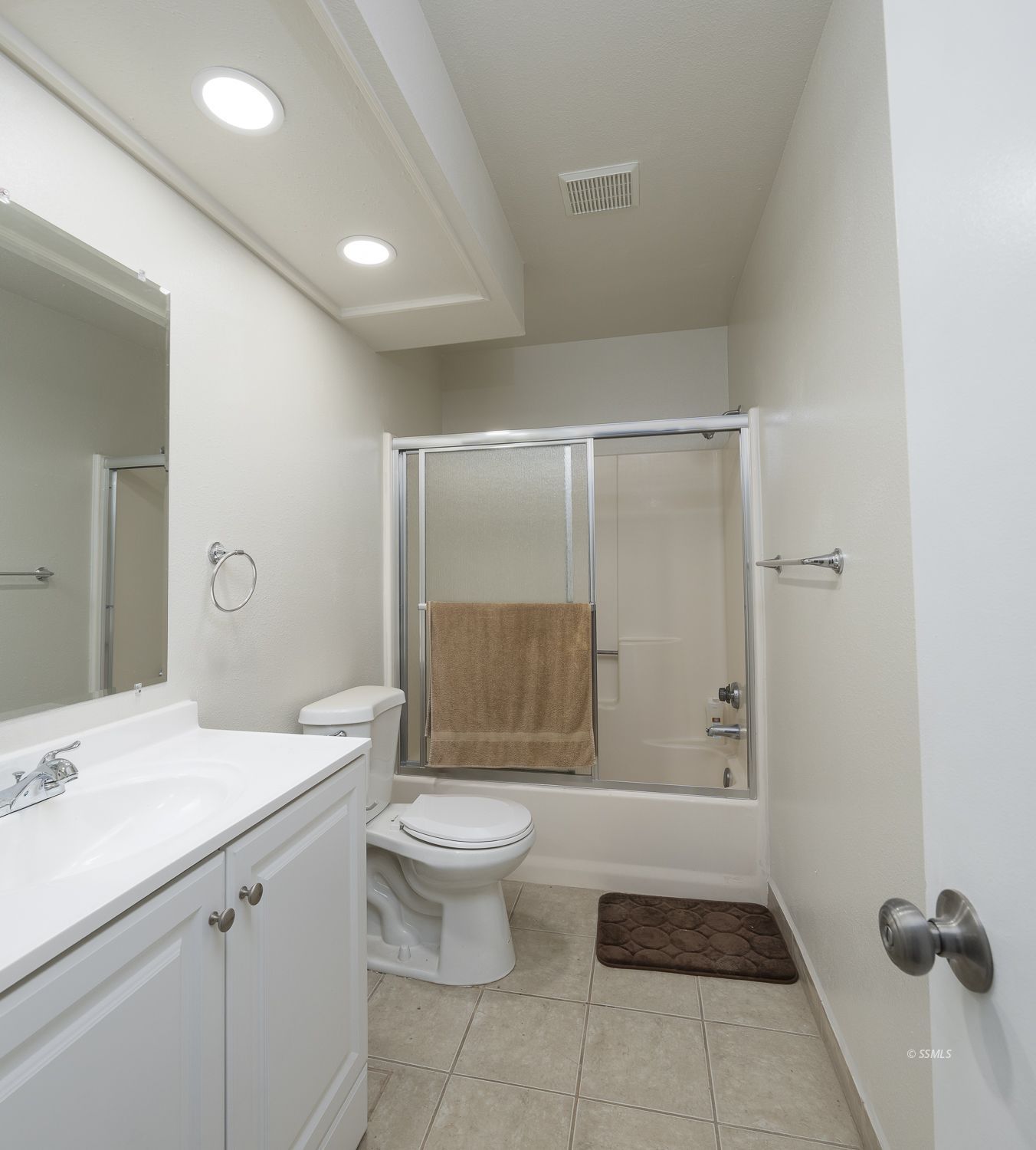 149 South Lilac Street Ridgecrest, CA 93555 - Photo 16 of 25 a bathroom with a granite countertop sink a toilet and shower