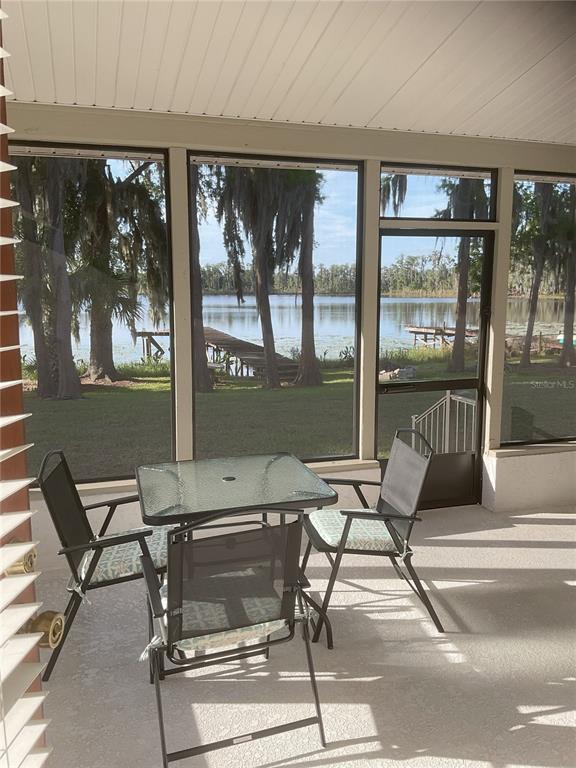 17005 Arrowhead Boulevard Winter Garden, FL 34787 - Photo 22 of 53 a work room with furniture and large windows