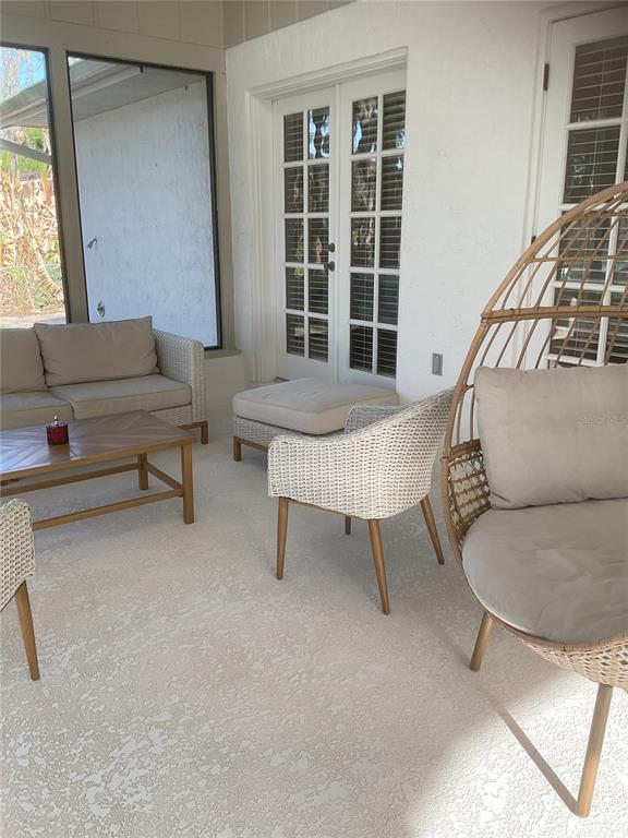 17005 Arrowhead Boulevard Winter Garden, FL 34787 - Photo 23 of 53 a living room with furniture and a window