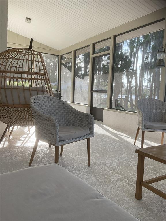 17005 Arrowhead Boulevard Winter Garden, FL 34787 - Photo 25 of 53 a living room with furniture and a window