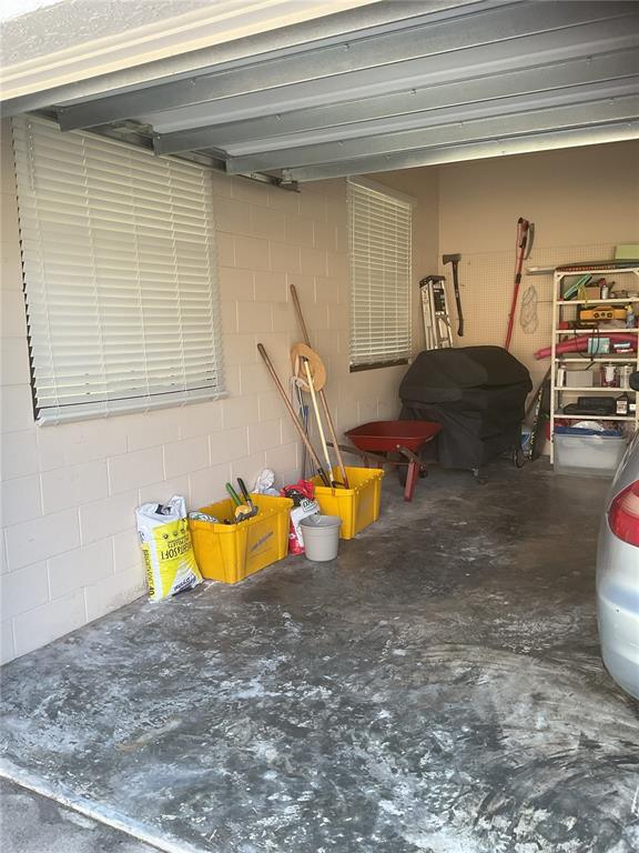 17005 Arrowhead Boulevard Winter Garden, FL 34787 - Photo 28 of 53 a view of a room with gym equipment