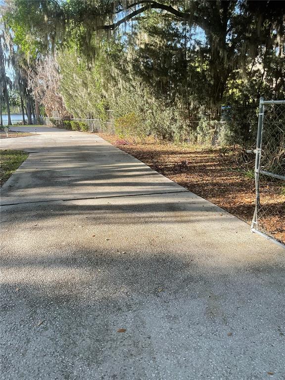 17005 Arrowhead Boulevard Winter Garden, FL 34787 - Photo 38 of 53 a view of a house with a street