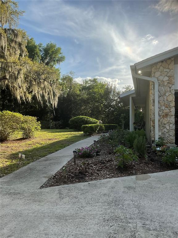 17005 Arrowhead Boulevard Winter Garden, FL 34787 - Photo 41 of 53 a view of a garden with an outdoor space