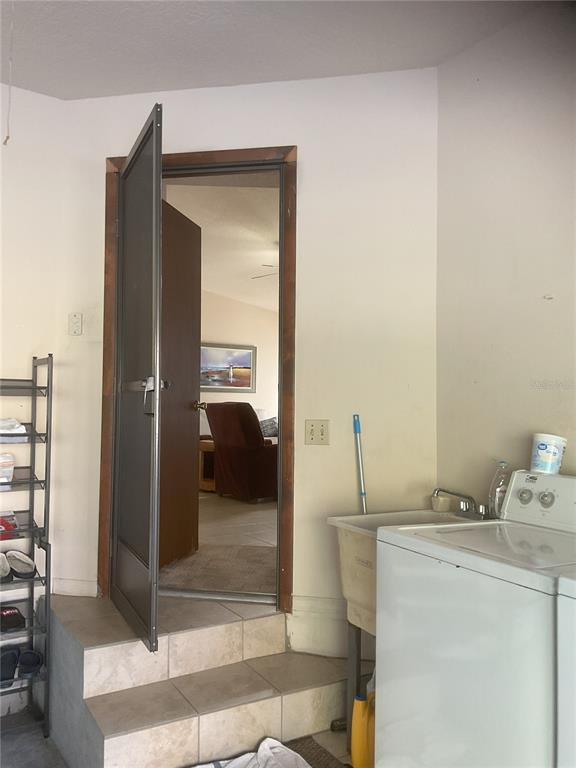 17005 Arrowhead Boulevard Winter Garden, FL 34787 - Photo 43 of 53 a bathroom with a sink and a mirror