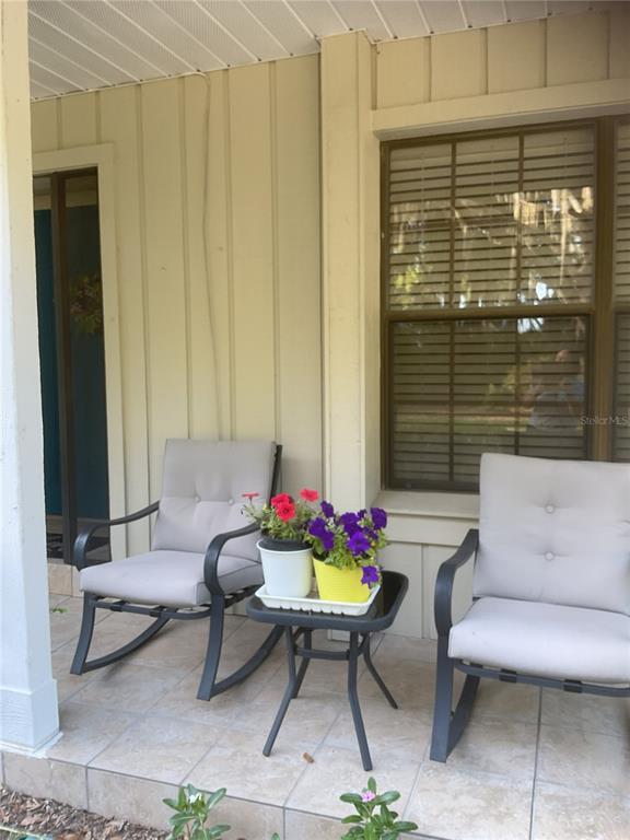 17005 Arrowhead Boulevard Winter Garden, FL 34787 - Photo 45 of 53 a living room with furniture and a potted plant