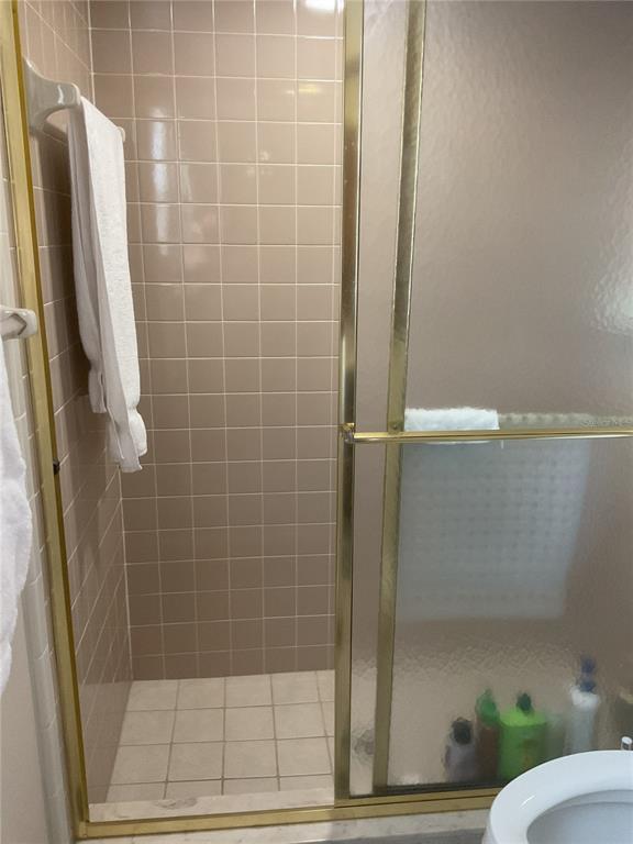 17005 Arrowhead Boulevard Winter Garden, FL 34787 - Photo 10 of 53 a bathroom with a shower