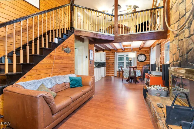 a view of balcony with dining table and chairs