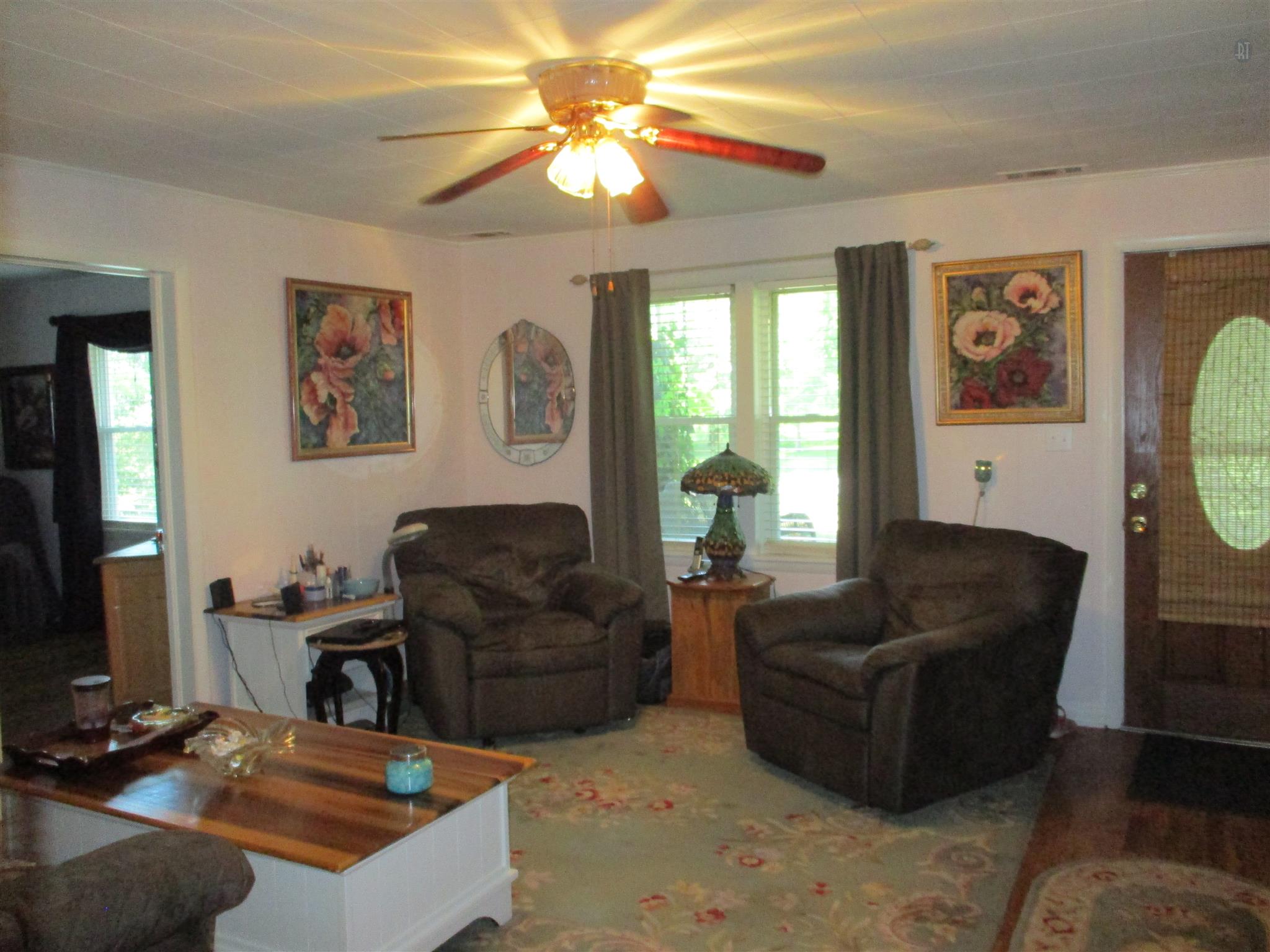 23 Ingram Road Leoma, TN 38468 - Photo 2 of 22 a living room with furniture and a flat screen tv