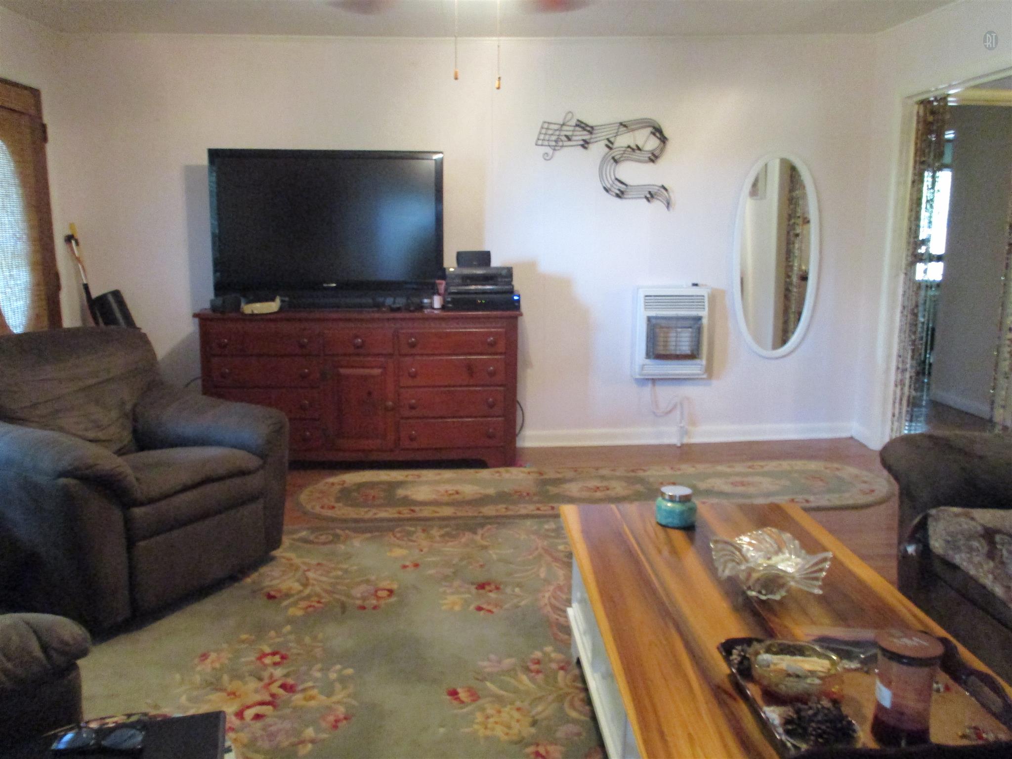 23 Ingram Road Leoma, TN 38468 - Photo 5 of 22 a living room with furniture and a flat screen tv