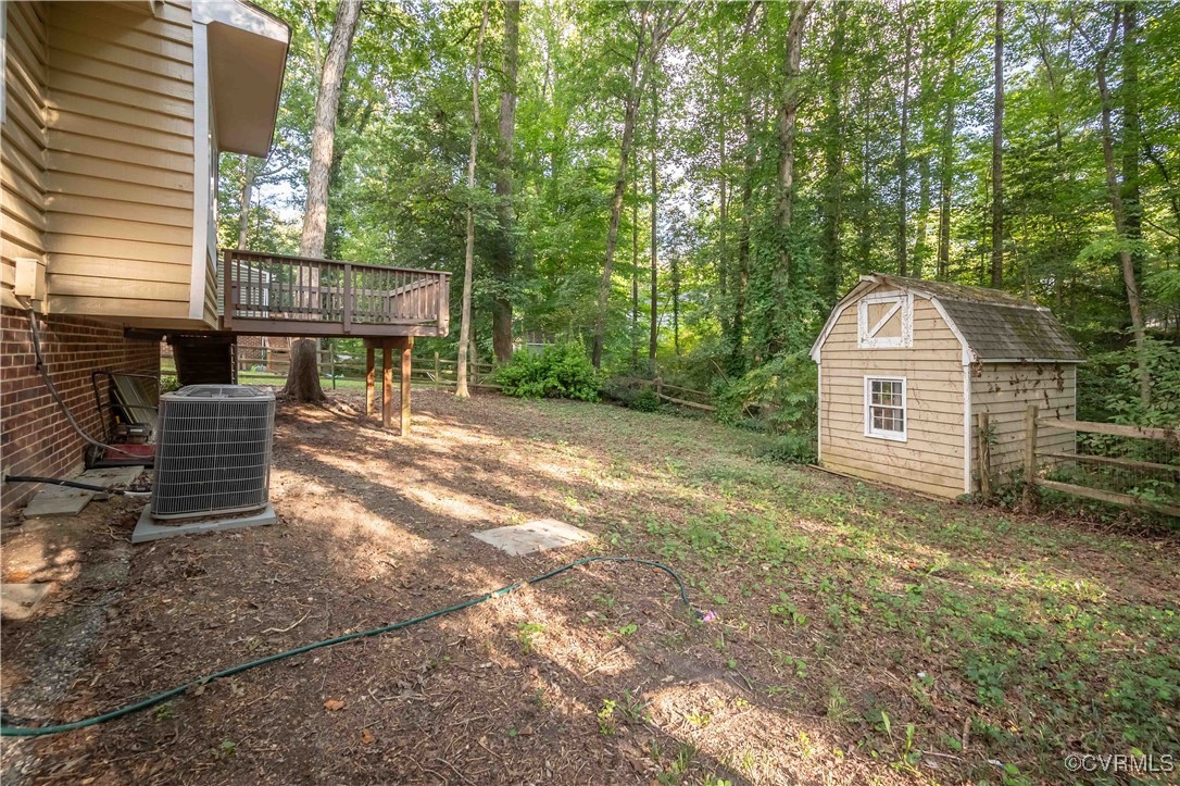 10313 Natural Bridge Road North Chesterfield, VA 23236 - Photo 27 of 31 a front view of a house with a garden