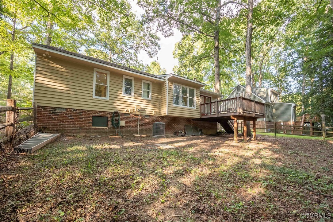 10313 Natural Bridge Road North Chesterfield, VA 23236 - Photo 28 of 31 a front view of a house with a yard covered in snow
