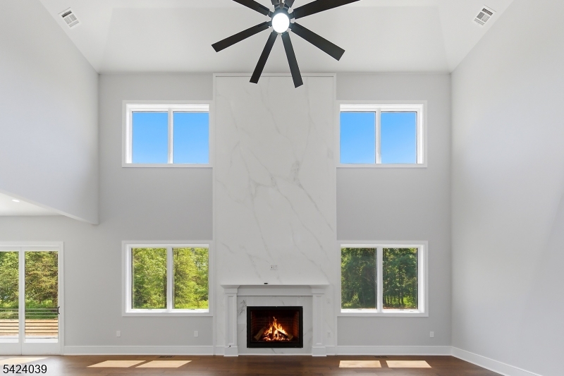 45 Kildee Road Belle Mead, NJ 08502 - Photo 36 of 43 a view of a livingroom with a ceiling fan and windows