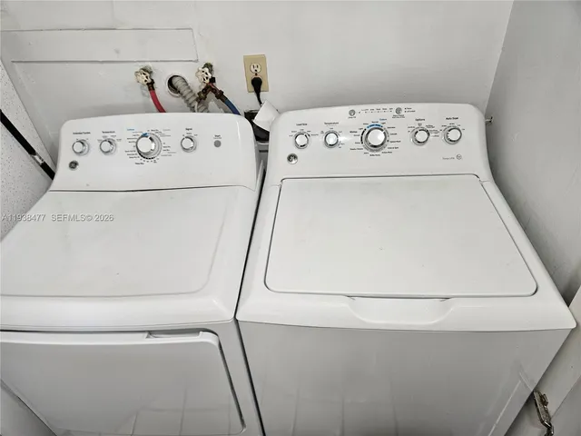 a close up view of washer and dryer with washer