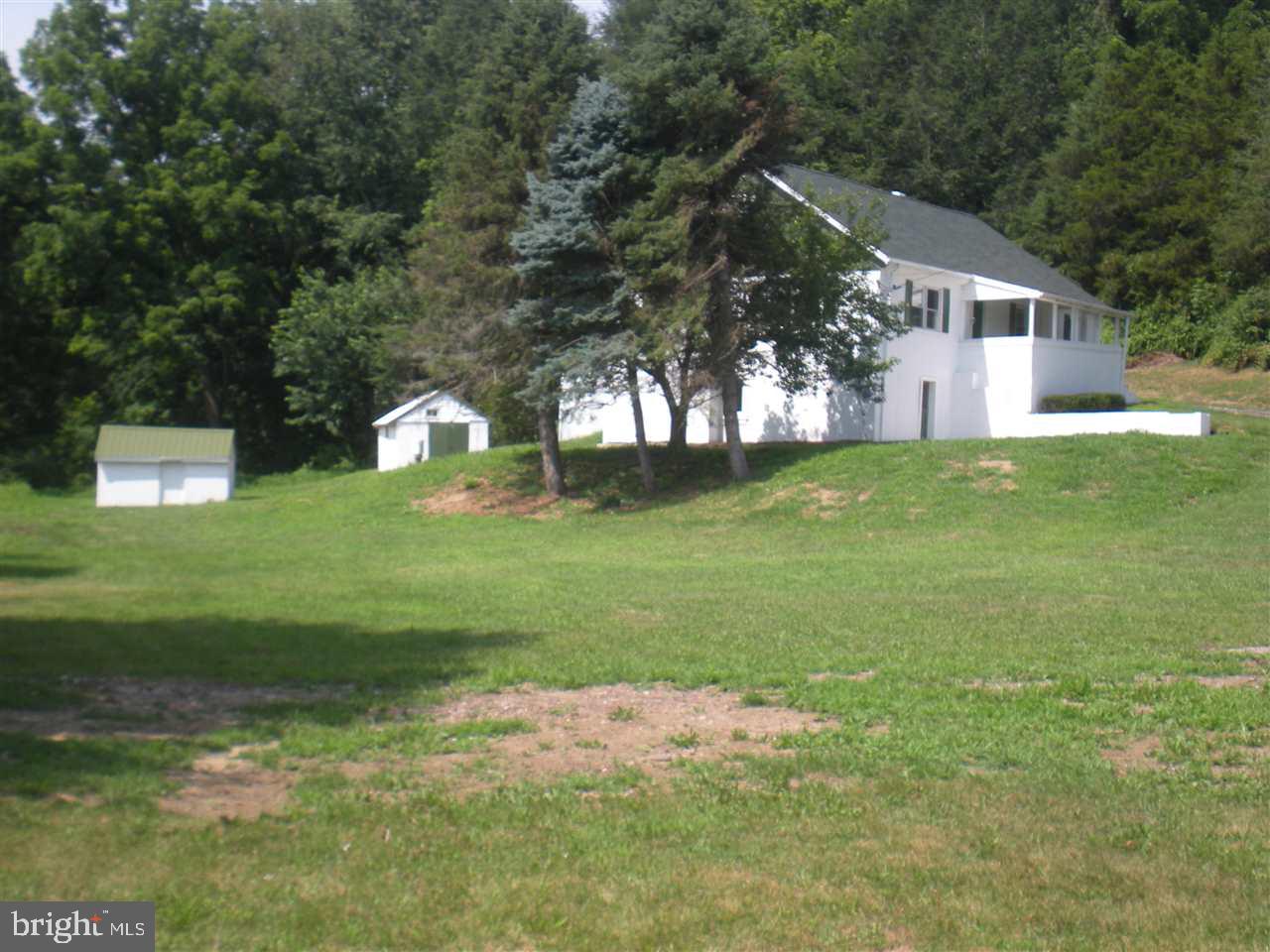 1588 Trolley Road Hanover, PA 17331 - Photo 2 of 31 a backyard of a house with lots of green space