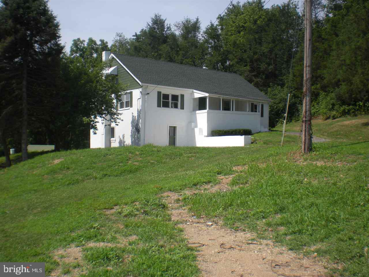1588 Trolley Road Hanover, PA 17331 - Photo 3 of 31 a front view of a house with yard and green space