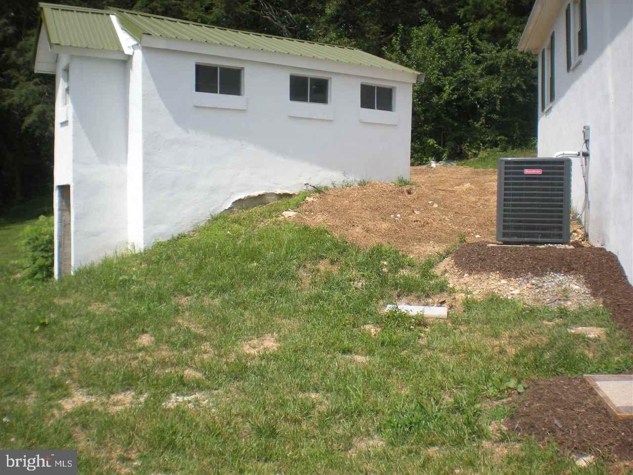 1588 Trolley Road Hanover, PA 17331 - Photo 30 of 31 a backyard of a house with plants and garden