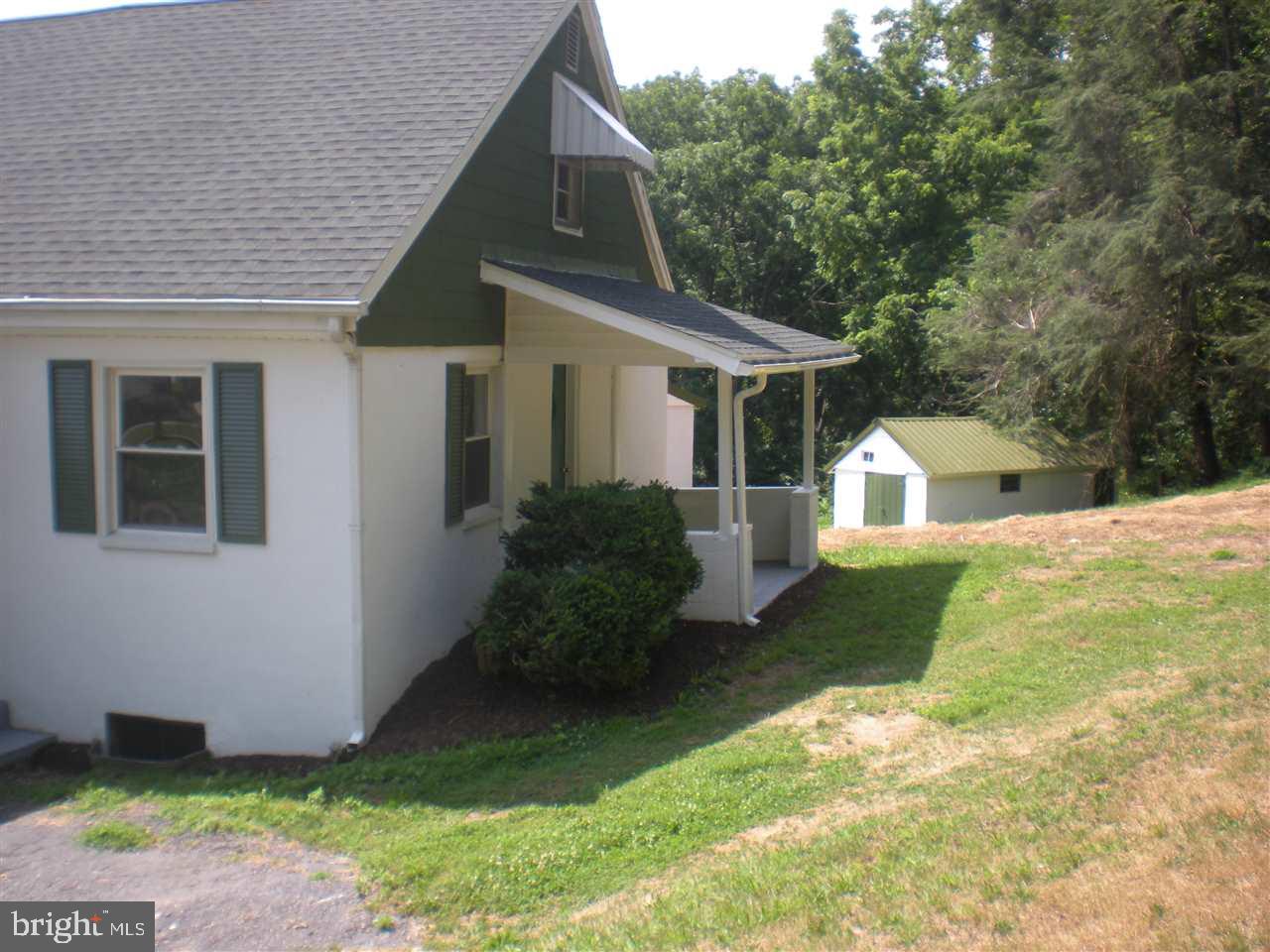 1588 Trolley Road Hanover, PA 17331 - Photo 5 of 31 a view of a house with yard and a garden