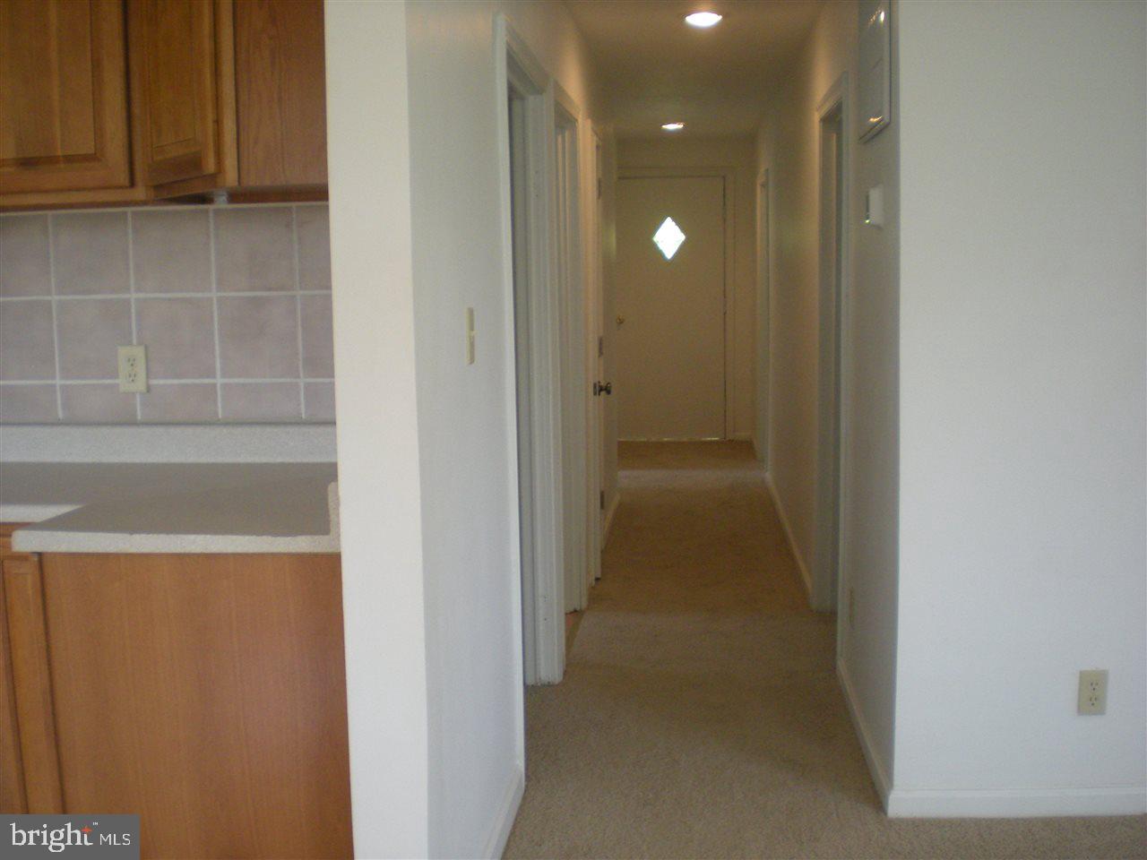 1588 Trolley Road Hanover, PA 17331 - Photo 8 of 31 a view of a hallway with wooden cabinets