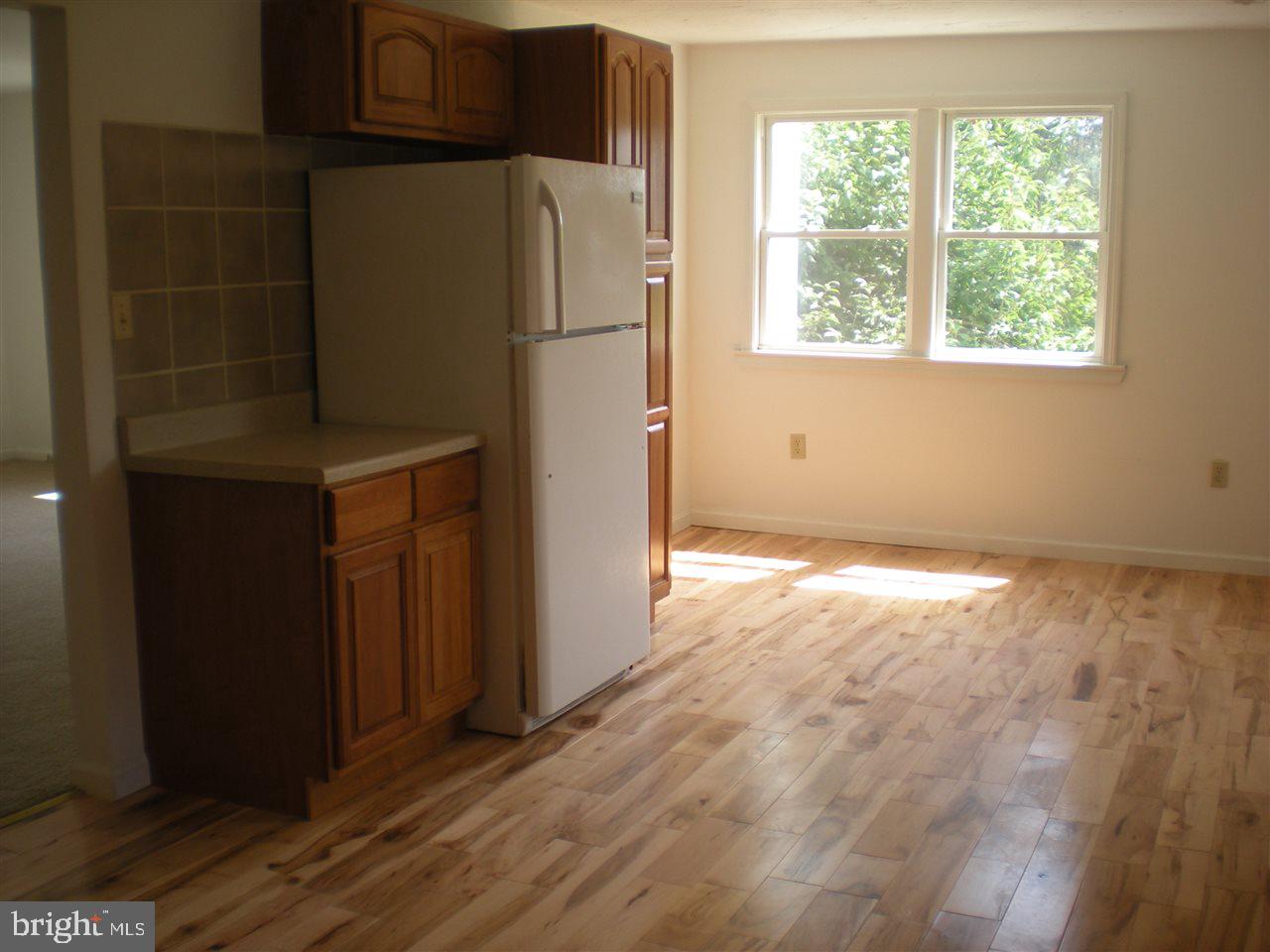1588 Trolley Road Hanover, PA 17331 - Photo 9 of 31 a view of a kitchen with wooden floor and a window