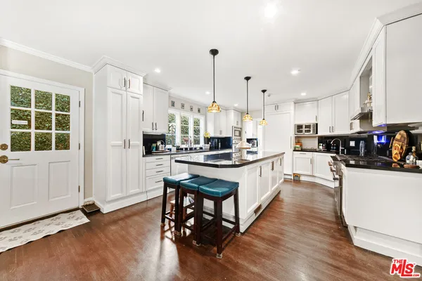 a bedroom with bed and window