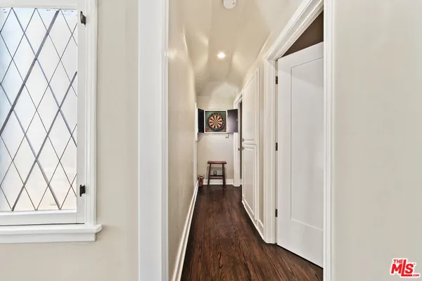 a front view of a house with a yard table and chairs