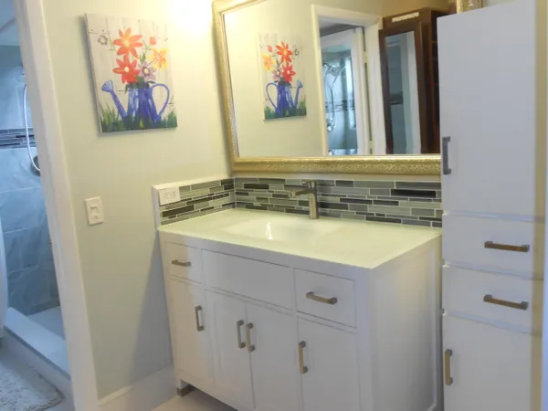 a bathroom with a toilet and a sink