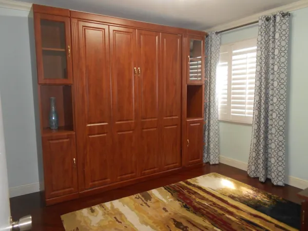 a view of front door with wooden floor