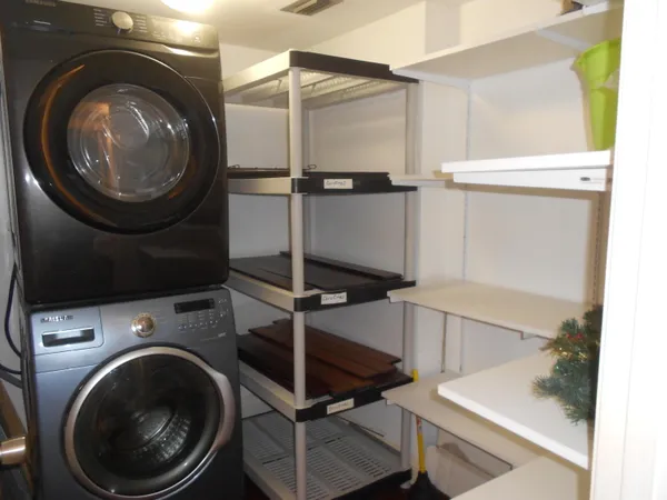 a view of swimming pool with a yard and a chair