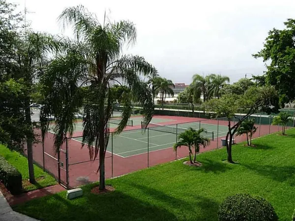 a view of a lake with a yard