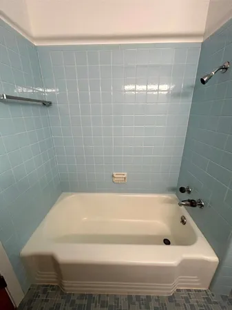 a bathroom with a bathtub
