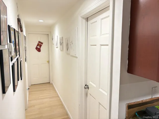 a bathroom with a shower and a glass door