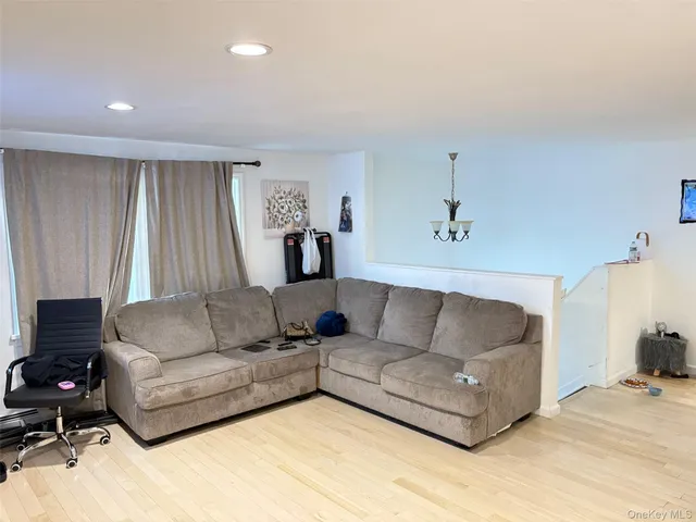 a living room with furniture and a couch