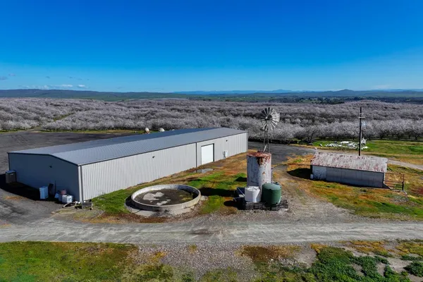 a view of a lake with a building in the background
