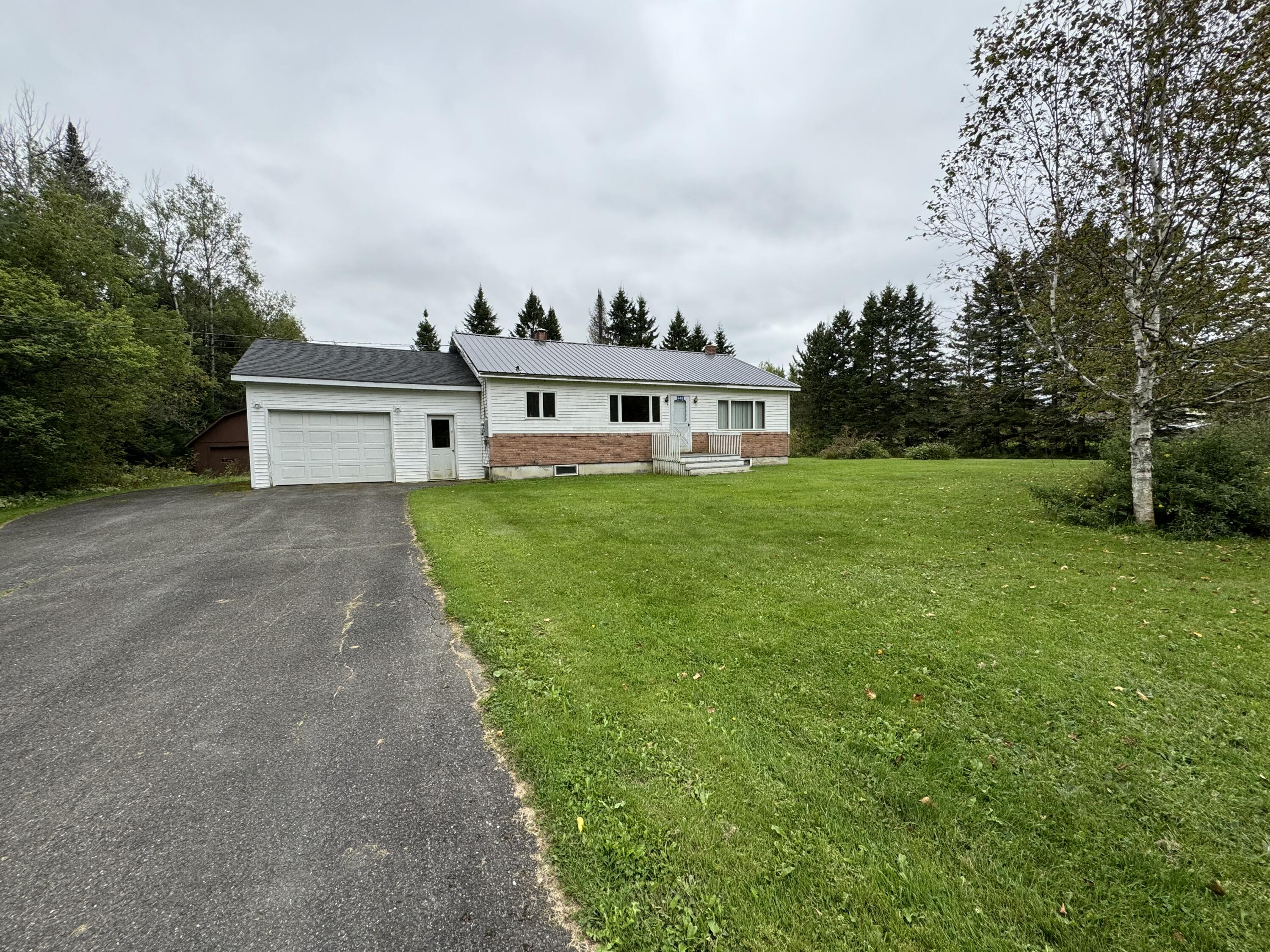 448 Bog Road Limestone, ME 04750 - Photo 2 of 40 9BDA8EA5-CFDA-4ADF-93DD-64CE81FC2656