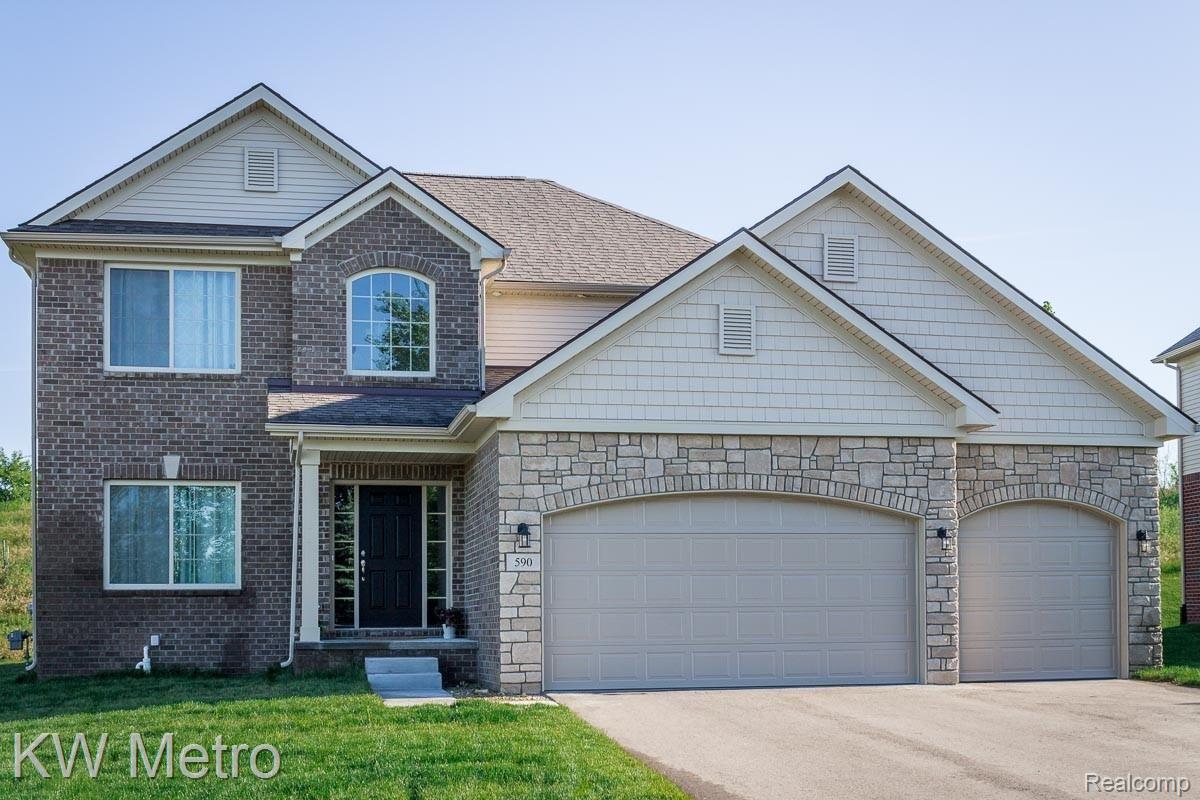 5146 Bradmore Road Warren, MI 48092 - Photo 2 of 18 Dover 3-Car Light Brick & Stone.jpg