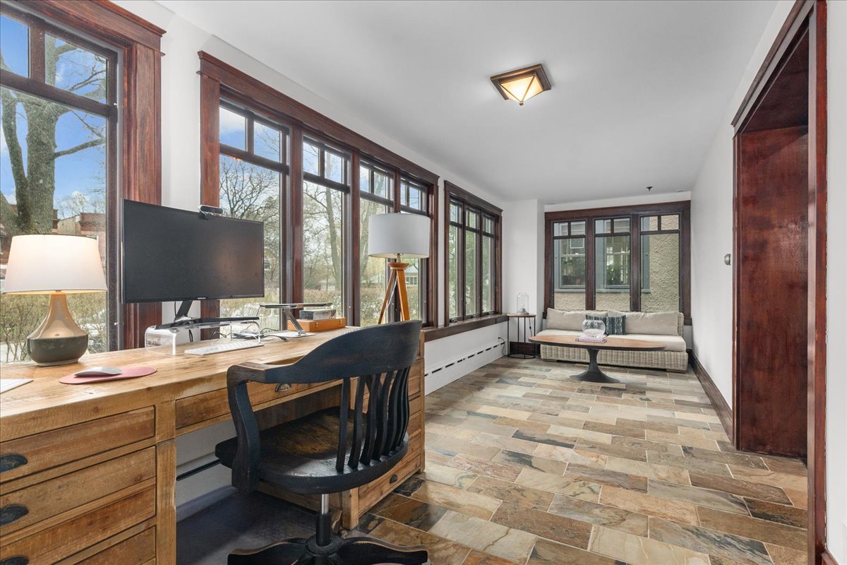 2087 West Greenleaf Avenue Chicago, IL 60645 - Photo 11 of 35 a view of a workspace with furniture and a window