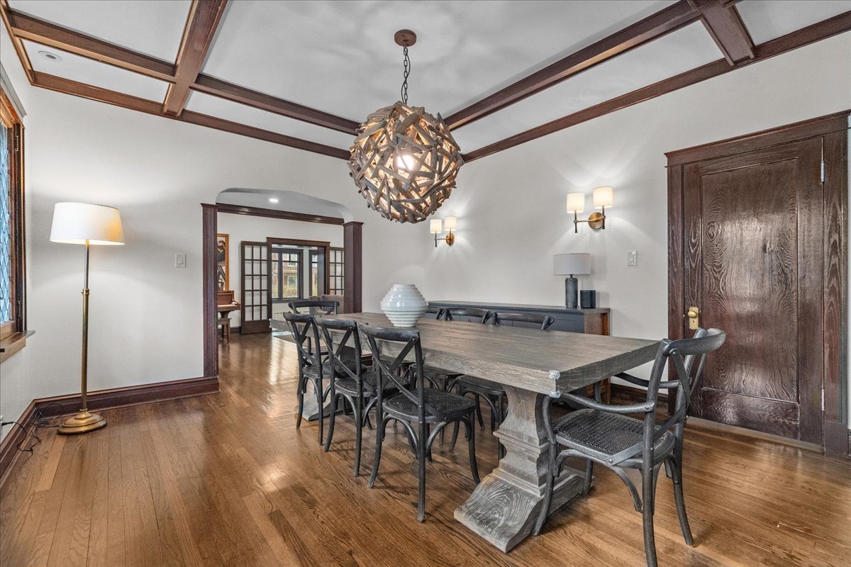 2087 West Greenleaf Avenue Chicago, IL 60645 - Photo 15 of 35 a view of a dining room with furniture window and wooden floor