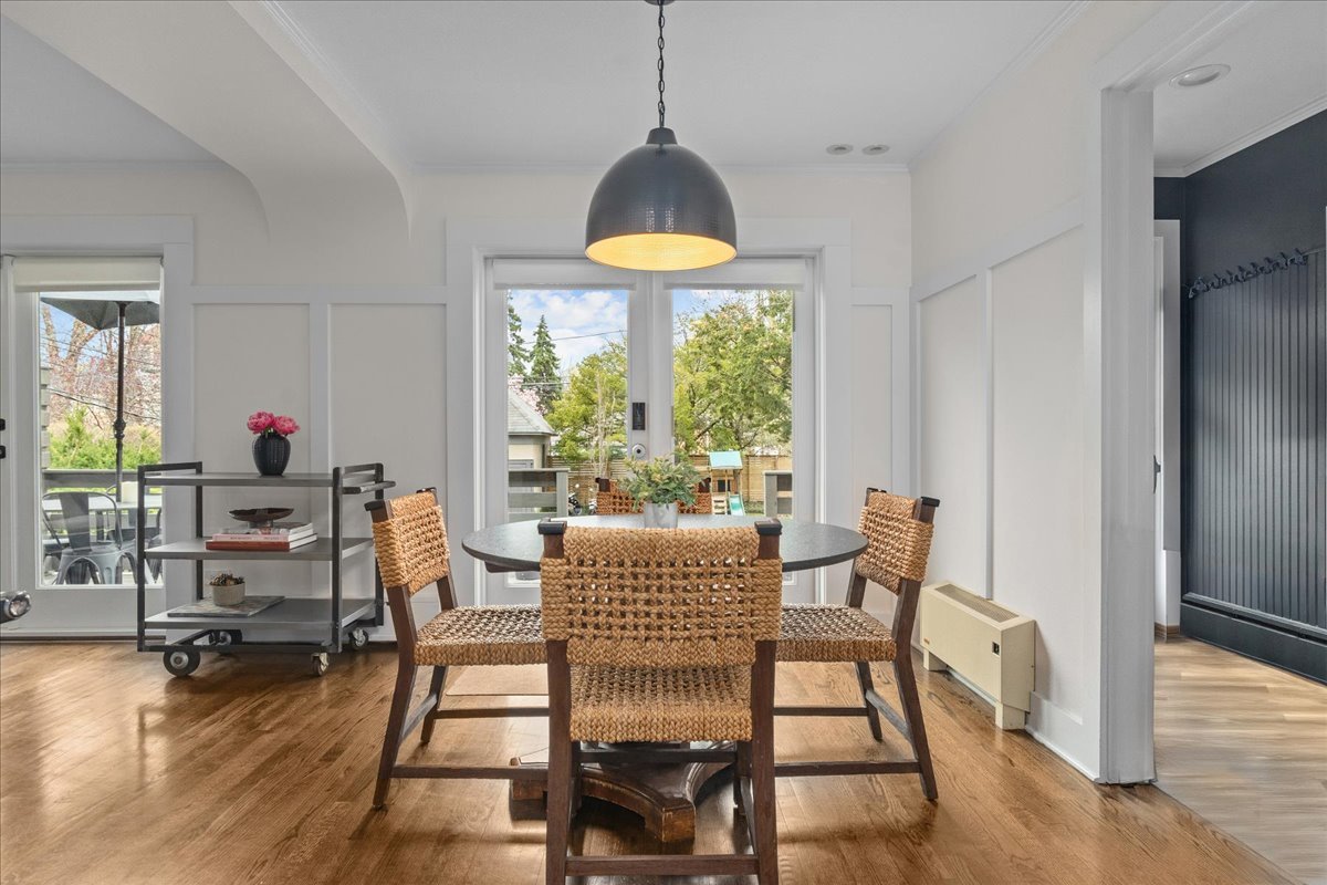 2087 West Greenleaf Avenue Chicago, IL 60645 - Photo 20 of 35 a dining room with furniture window and wooden floor