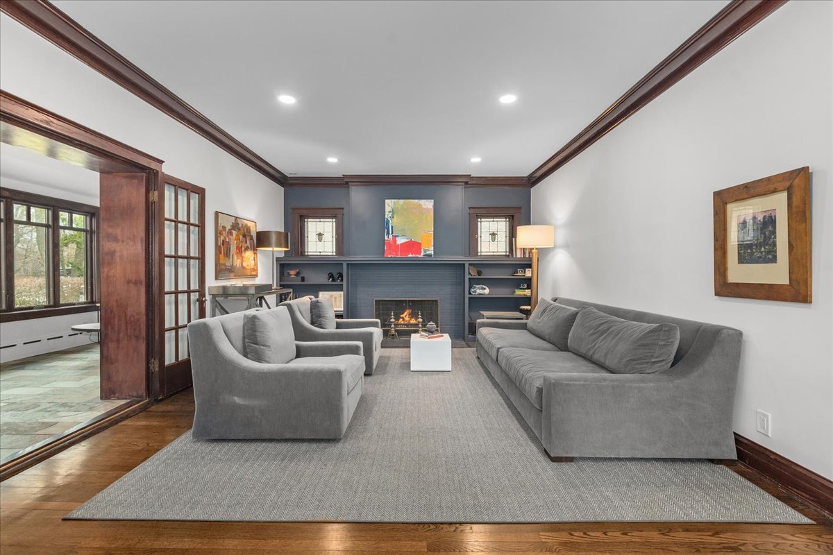 2087 West Greenleaf Avenue Chicago, IL 60645 - Photo 9 of 35 a living room with furniture and a fireplace