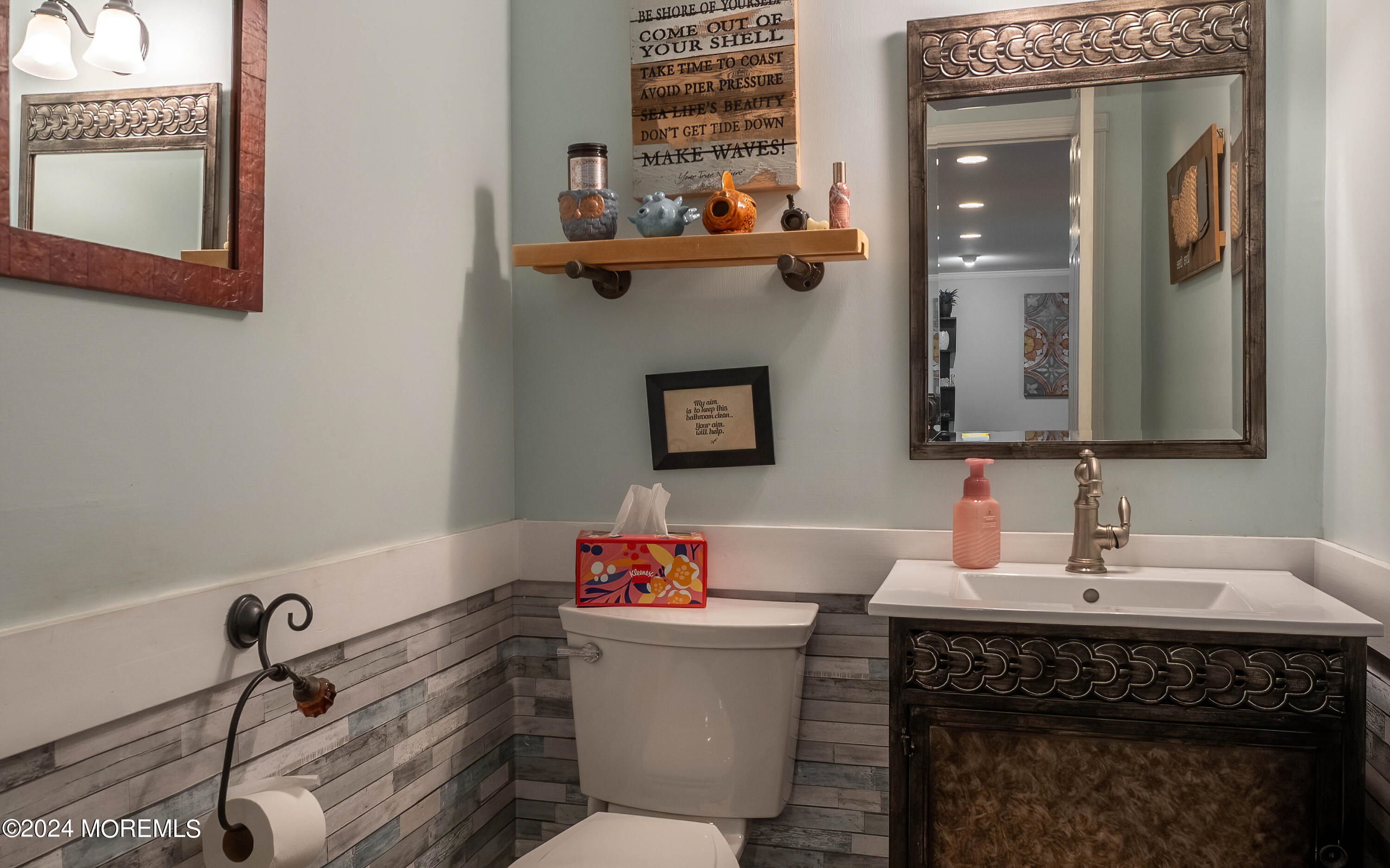 240 Eastham Road Point Pleasant, NJ 08742 - Photo 29 of 44 a bathroom with a sink and a mirror