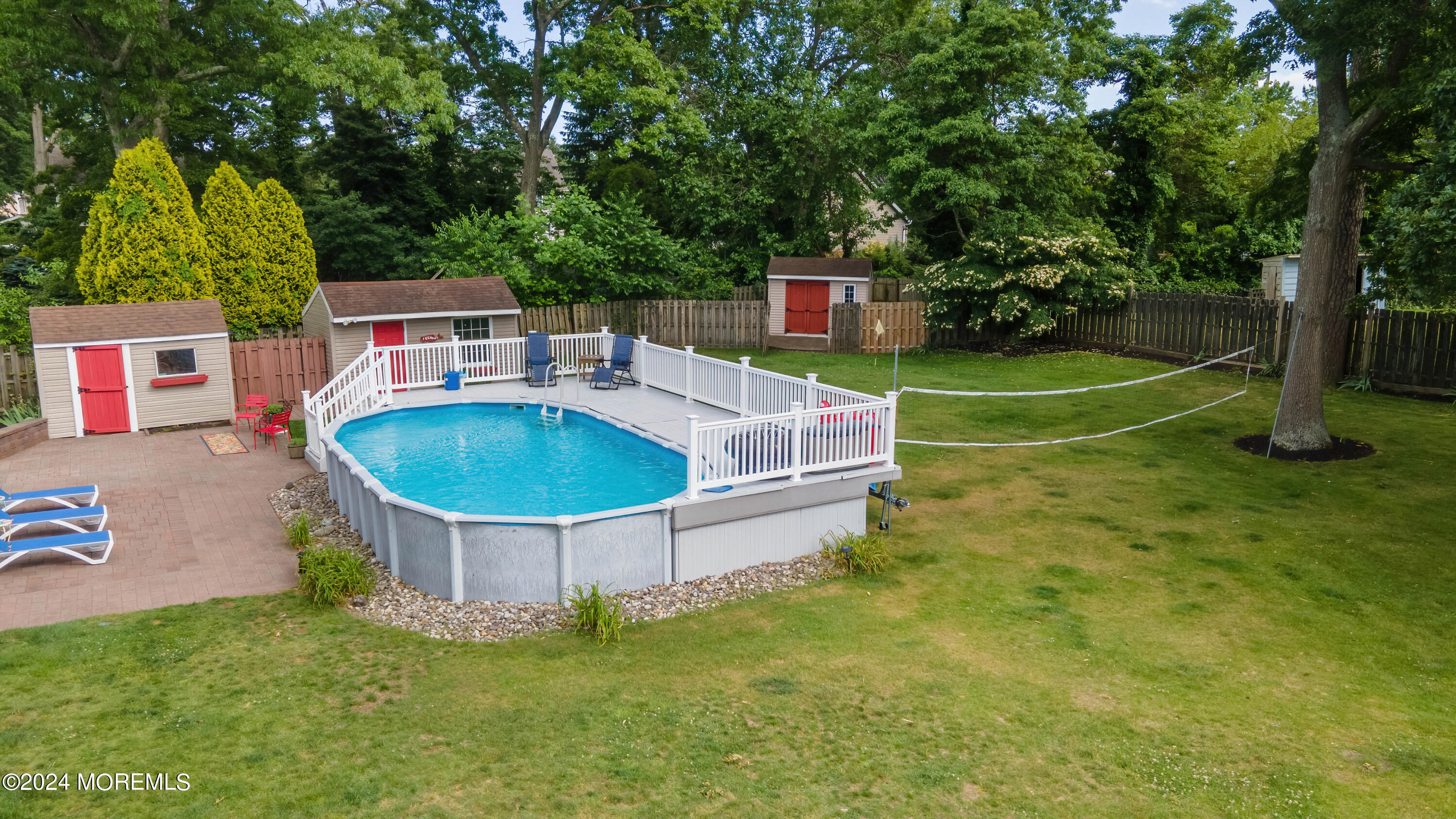 240 Eastham Road Point Pleasant, NJ 08742 - Photo 3 of 44 a view of a backyard with swimming pool