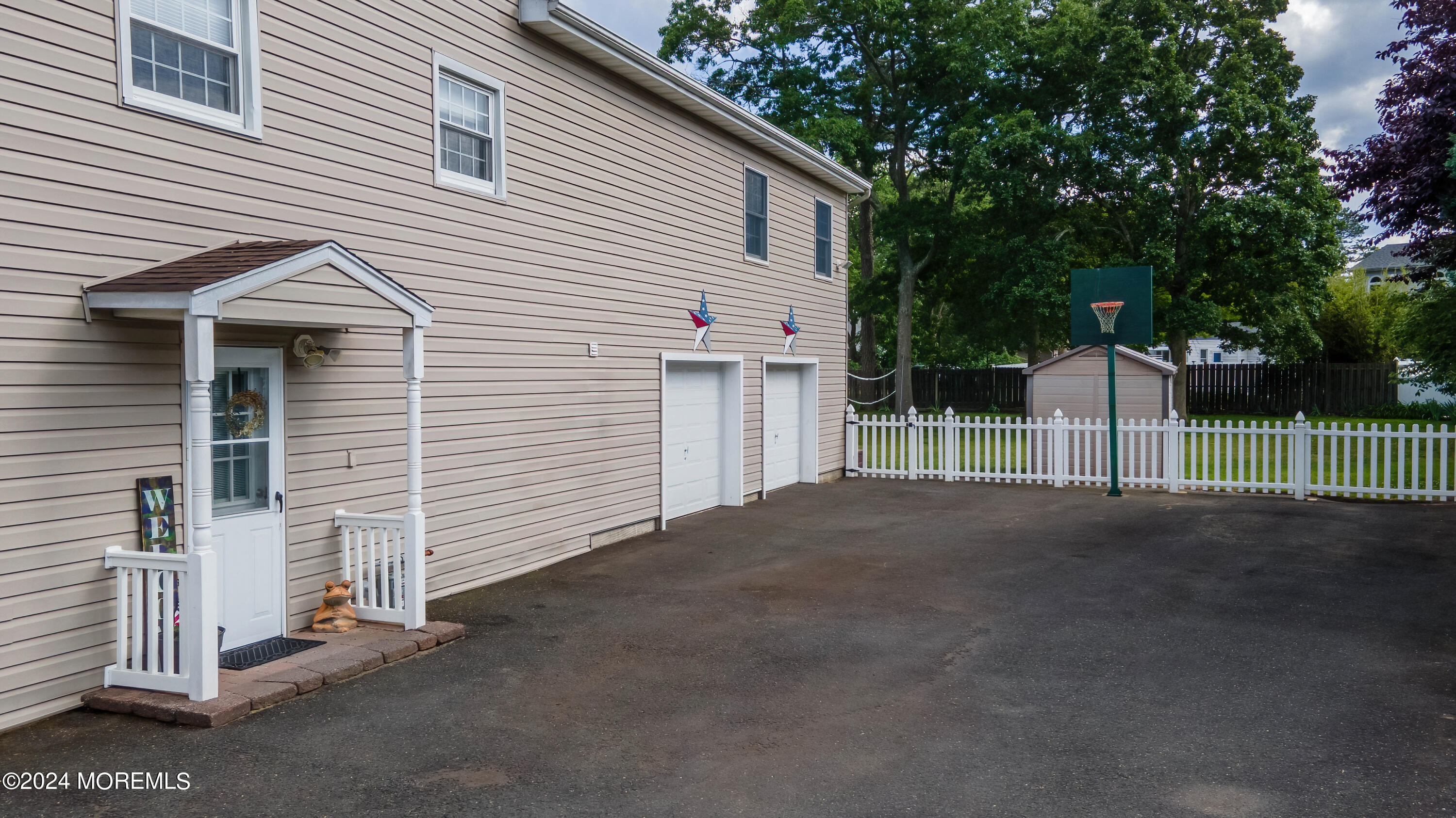 240 Eastham Road Point Pleasant, NJ 08742 - Photo 44 of 44 a view of a house with a garage