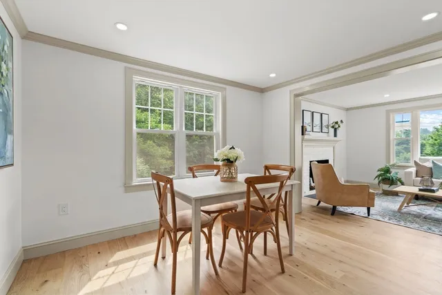 a view of a dining room with furniture window and outside view
