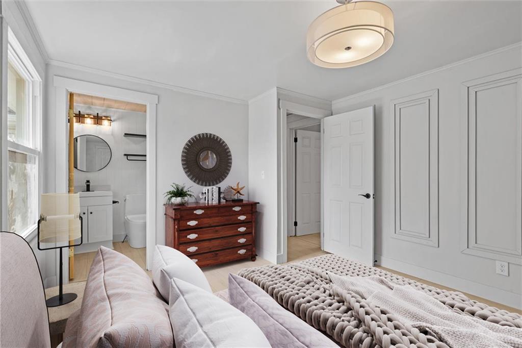 319 Gringo Independence Road Aliquippa, PA 15001 - Photo 11 of 25 a bedroom with a bed and cabinets