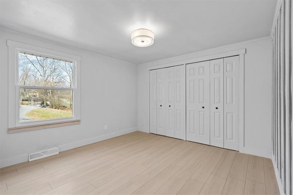 319 Gringo Independence Road Aliquippa, PA 15001 - Photo 17 of 25 an empty room with windows and closet