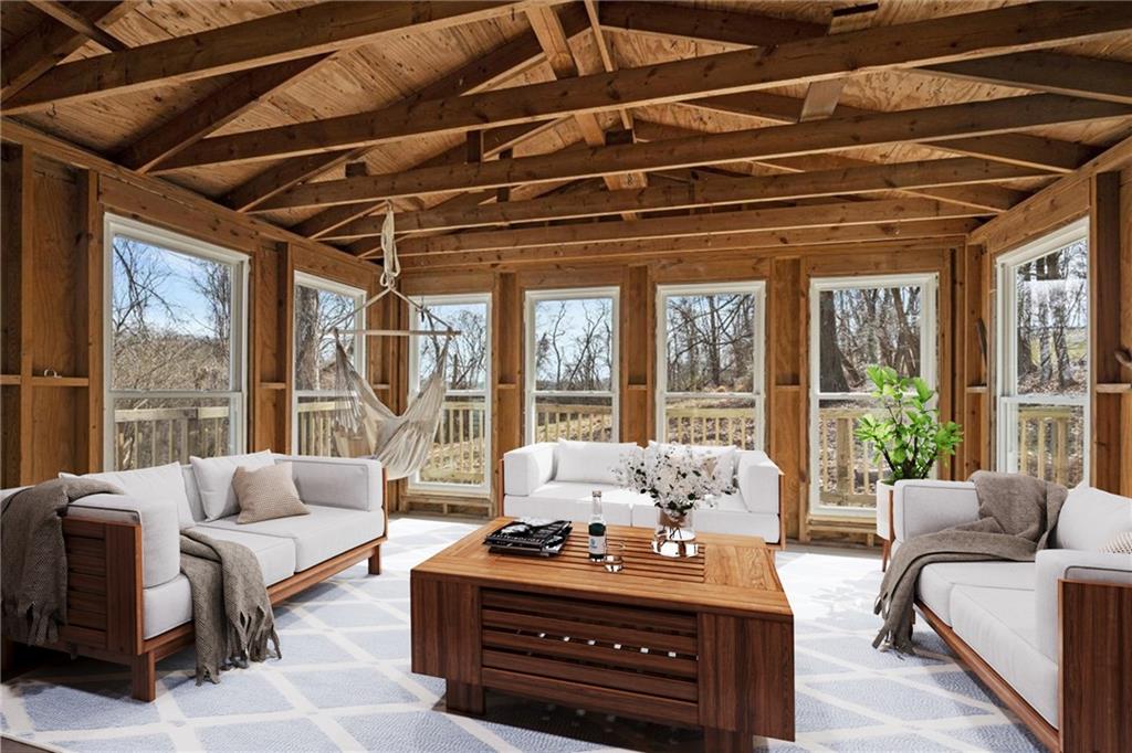 319 Gringo Independence Road Aliquippa, PA 15001 - Photo 20 of 25 a living room with furniture and floor to ceiling windows