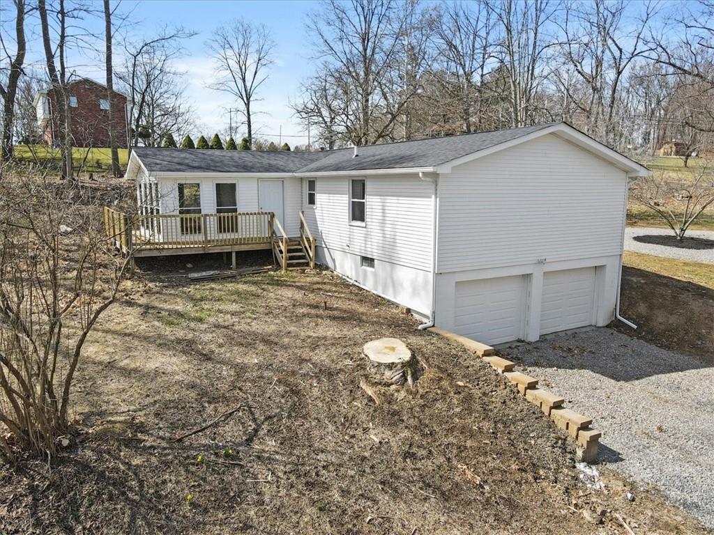 319 Gringo Independence Road Aliquippa, PA 15001 - Photo 23 of 25 a view of a house with a yard