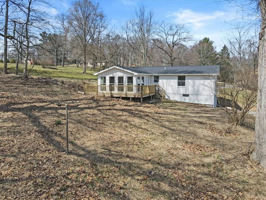 319 Gringo Independence Road Aliquippa, PA 15001 - Photo 24 of 25 a front view of a house with a yard