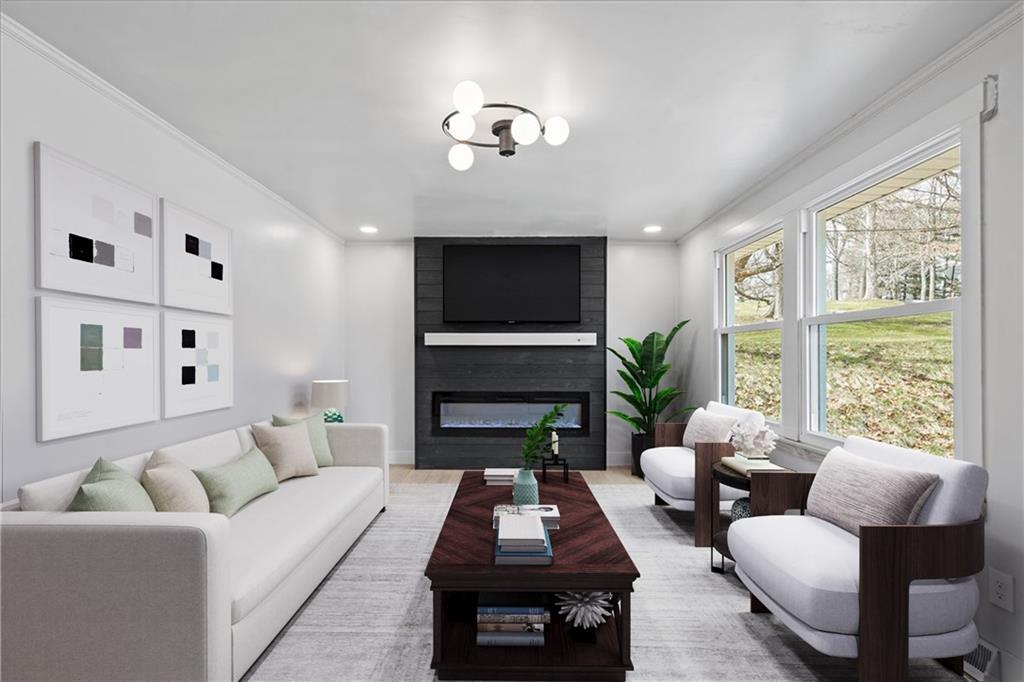 319 Gringo Independence Road Aliquippa, PA 15001 - Photo 3 of 25 a living room with furniture fireplace and window