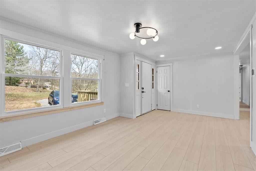 319 Gringo Independence Road Aliquippa, PA 15001 - Photo 5 of 25 a view of an empty room with a window